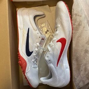 Nike White Track Spikes with Red and blue Accents